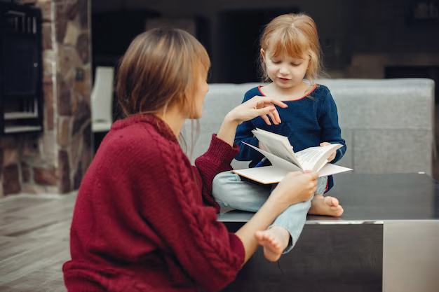Mother and daughter reading a book
